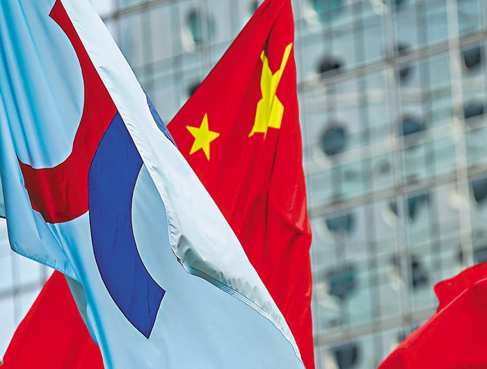 香港资本市场迎中概股回归潮，上市条件及成本成焦点